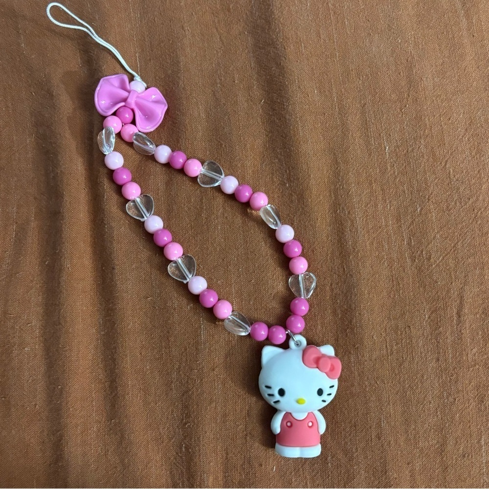 NWT Sanrio Hello Kitty Bow Phone Wristlet Pink - Picture 6 of 9